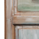 Cuadro con motivo campestre sobre puerta antigua